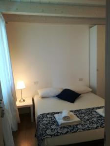 Voodi või voodid majutusasutuse B&B Aria d'Argento & Relax Home toas