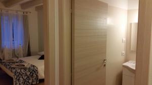 Voodi või voodid majutusasutuse B&B Aria d'Argento & Relax Home toas