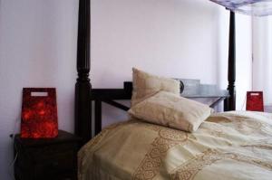 Postel nebo postele na pokoji v ubytování Arthotel Landhaus Zur Alten Gärtnerei