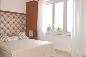 Кровать или кровати в номере Hotel Noris