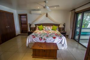 Postel nebo postele na pokoji v ubytování Rendezvous Villas + 11 fotografií