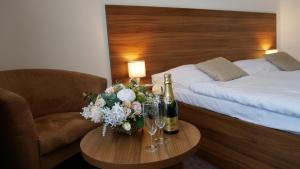 Posteľ alebo postele v izbe v ubytovaní Hotel Saffron + 37 fotografií