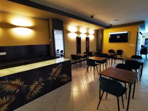 TV a/nebo společenská místnost v ubytování STARK HOTEL