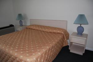 Postel nebo postele na pokoji v ubytování Point 1 Resort & Motel