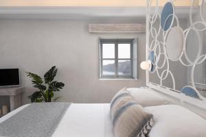 Posteľ alebo postele v izbe v ubytovaní Bubble Suite Santorini