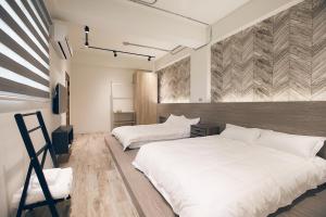 Postel nebo postele na pokoji v ubytování King Win Homestay