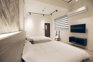 Voodi või voodid majutusasutuse King Win Homestay toas