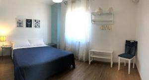 A bed or beds in a room at Corte Colori