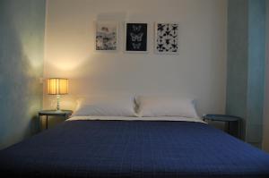 A bed or beds in a room at Corte Colori