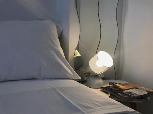 A bed or beds in a room at Corte Colori