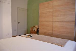 A bed or beds in a room at Corte Colori