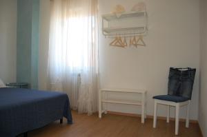 A bed or beds in a room at Corte Colori