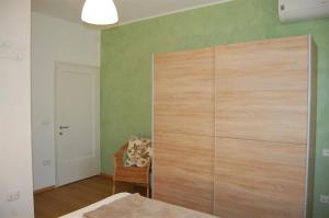 A bed or beds in a room at Corte Colori