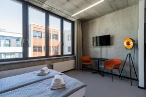 Ένα ή περισσότερα κρεβάτια σε δωμάτιο στο Nena Apartments Moritzplatz