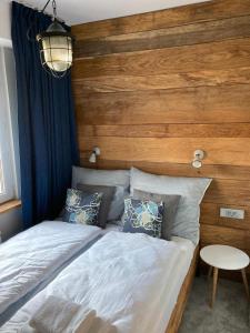 Posteľ alebo postele v izbe v ubytovaní Apartament Komorowskiego