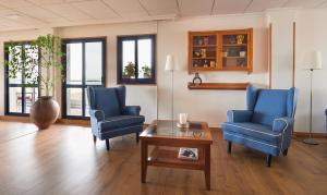 Posezení v ubytování Hotel Juan de la Cosa