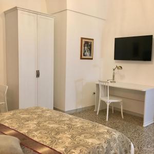 TV a/nebo společenská místnost v ubytování B&B dai Mimmi