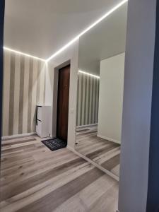 TV a/nebo společenská místnost v ubytování Buto nuoma Dariaus ir Girėno gatvėje