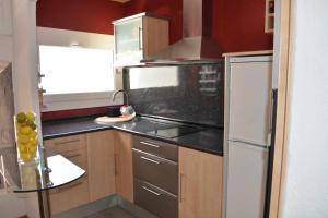 Kuchyňa alebo kuchynka v ubytovaní Apartamento CarabelaSiente la brisa del mar
