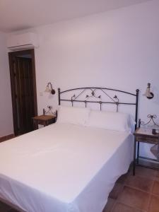 Posteľ alebo postele v izbe v ubytovaní Hotel Rural Xerete