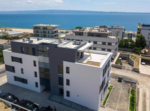 an aerial view of a building near the ocean at Ledeno more Luxury Apartments in Split