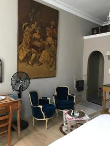 Khu vực ghế ngồi tại B&B Le flaneur