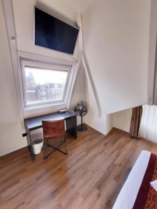 TV a/nebo společenská místnost v ubytování Hotel Washington