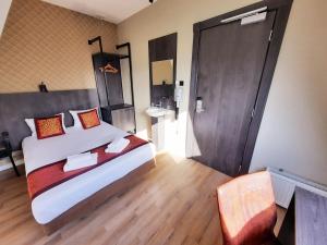 Postel nebo postele na pokoji v ubytování Hotel Washington