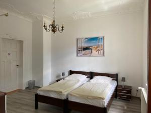 Postel nebo postele na pokoji v ubytování Villa am Meer - Stralsund