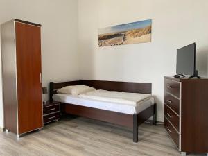 Postel nebo postele na pokoji v ubytování Villa am Meer - Stralsund