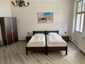 Postel nebo postele na pokoji v ubytování Villa am Meer - Stralsund