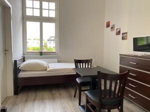 Postel nebo postele na pokoji v ubytování Villa am Meer - Stralsund