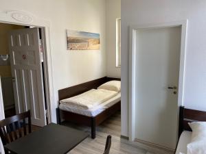 Postel nebo postele na pokoji v ubytování Villa am Meer - Stralsund