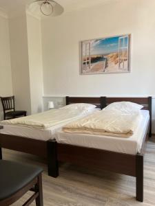 Postel nebo postele na pokoji v ubytování Villa am Meer - Stralsund