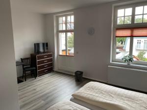 Postel nebo postele na pokoji v ubytování Villa am Meer - Stralsund