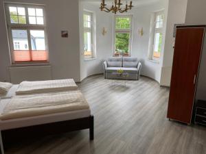 Postel nebo postele na pokoji v ubytování Villa am Meer - Stralsund