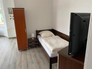 Postel nebo postele na pokoji v ubytování Villa am Meer - Stralsund