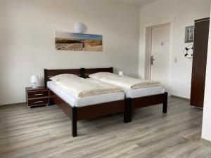 Postel nebo postele na pokoji v ubytování Villa am Meer - Stralsund