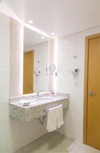 Bathroom sa Mogano Premium Hotel - ELETROPOSTO