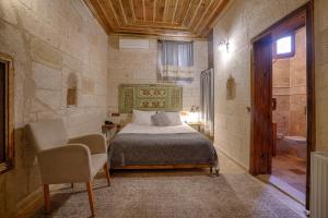 Voodi või voodid majutusasutuse Henna Hotel-Adults Only toas