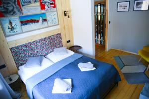Łóżko lub łóżka w pokoju w obiekcie NIECH TO SZLAK B&B
