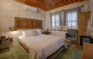 Voodi või voodid majutusasutuse Henna Hotel-Adults Only toas