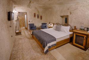 Voodi või voodid majutusasutuse Henna Hotel-Adults Only toas