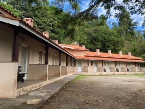 an old building with a lot of windows on it at Pousada Atibaia in Atibaia +18 photos