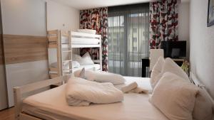 Postel nebo postele na pokoji v ubytování Ibex Hostel + 37 fotografií