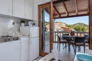 Kuchyň nebo kuchyňský kout v ubytování Apartments Fijan (A2)