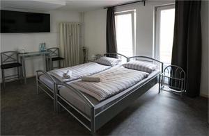 Postel nebo postele na pokoji v ubytování Zimmerfrei-Wuerzburg Stadtmitte