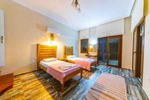 Ένα ή περισσότερα κρεβάτια σε δωμάτιο στο Villa Jasmin Selimiye - no pool - Daily Weekly Rentals
