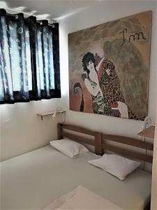 Posteľ alebo postele v izbe v ubytovaní Apartman L&P