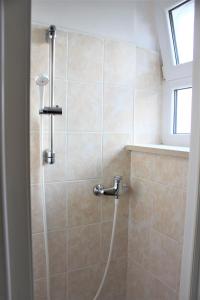 Kúpeľňa v ubytovaní Apartman L&P